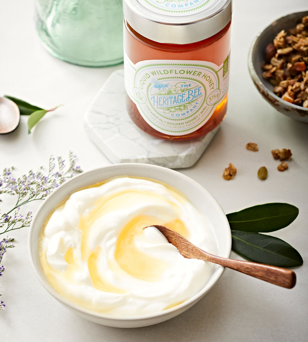Heritage Bee Co's premium liquid wildflower honey can be used in yogurt for added sweetness.
